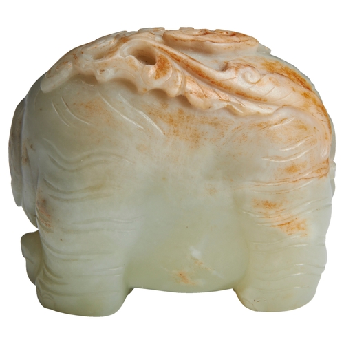 130 - A FINE WHITE JADE ELEPHANTQIANLONG PERIOD (1736-1795)青白玉象 乾隆 1736-1795the elephant is shown standing... 