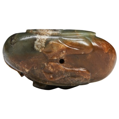 136 - A CELADON AND RUSSET JADE MANDARIN DUCKLATE MING DYNASTY褐玉鸳鸯衔荷花  晚明modelled as the duck facing forwa... 