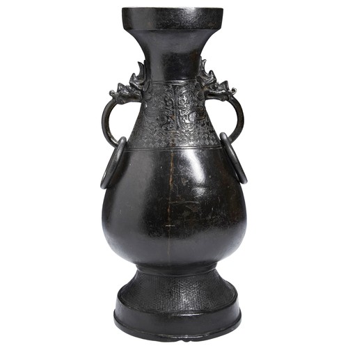 146 - CHINESE BRONZE LARGE VASE OF HU FORM,YUAN DYNASTY (1279-1368)双龙耳铜壶 元 1279-1368the pear shaped body d... 