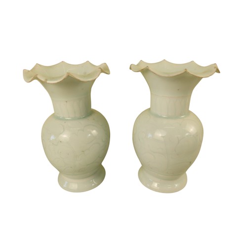 309 - A PAIR OF QINGBAI 'FLORAL' VASESSONG DYNASTY (960-1279)the globular sides with incised floral decora... 