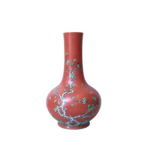 A LARGE CORAL-RED 'PRUNUS' BOTTLE VASE