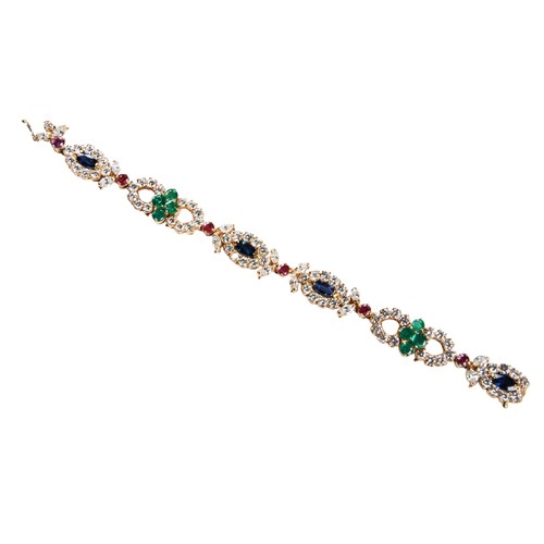 AN 18 CARAT GOLD DIAMOND, RUBY, SAPPHIRE AND EMERALD BRACELET