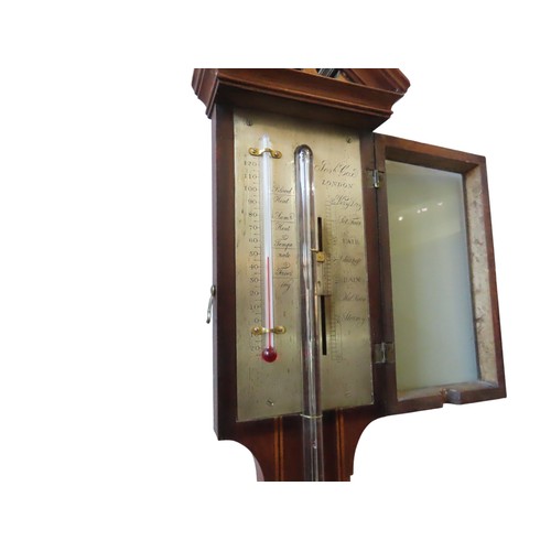 A GEORGE III MAHOGANY STICK BAROMETER, with break arch pediment and ...