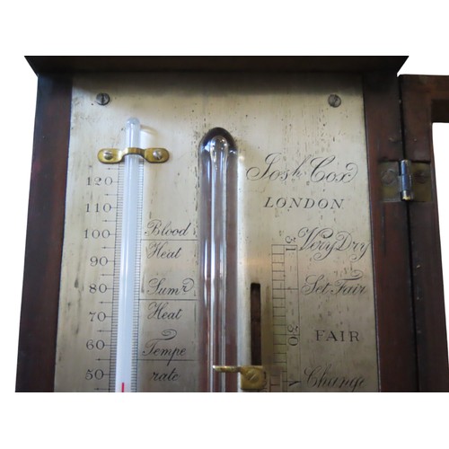 A GEORGE III MAHOGANY STICK BAROMETER, with break arch pediment and ...