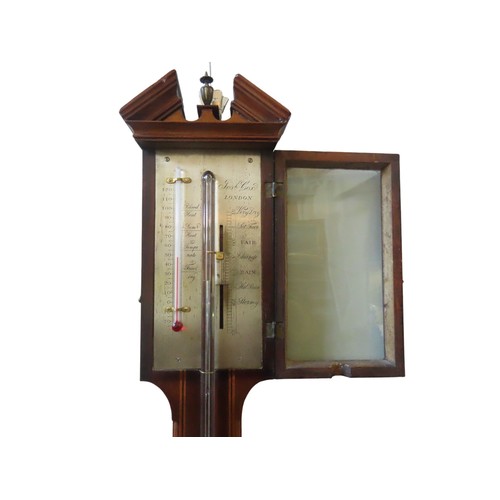 A GEORGE III MAHOGANY STICK BAROMETER, with break arch pediment and ...