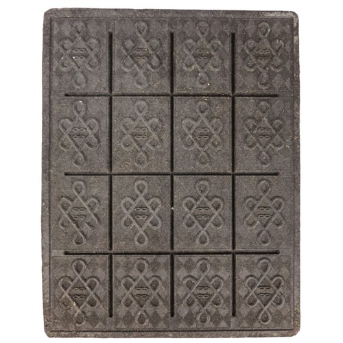 A CHINESE BLACK TEA BRICKthe central panel with pressed decoration ...