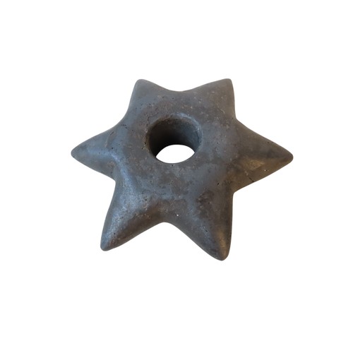 A PERUVIAN STAR-SHAPED STONE MACE HEAD with six points emanating from a ...
