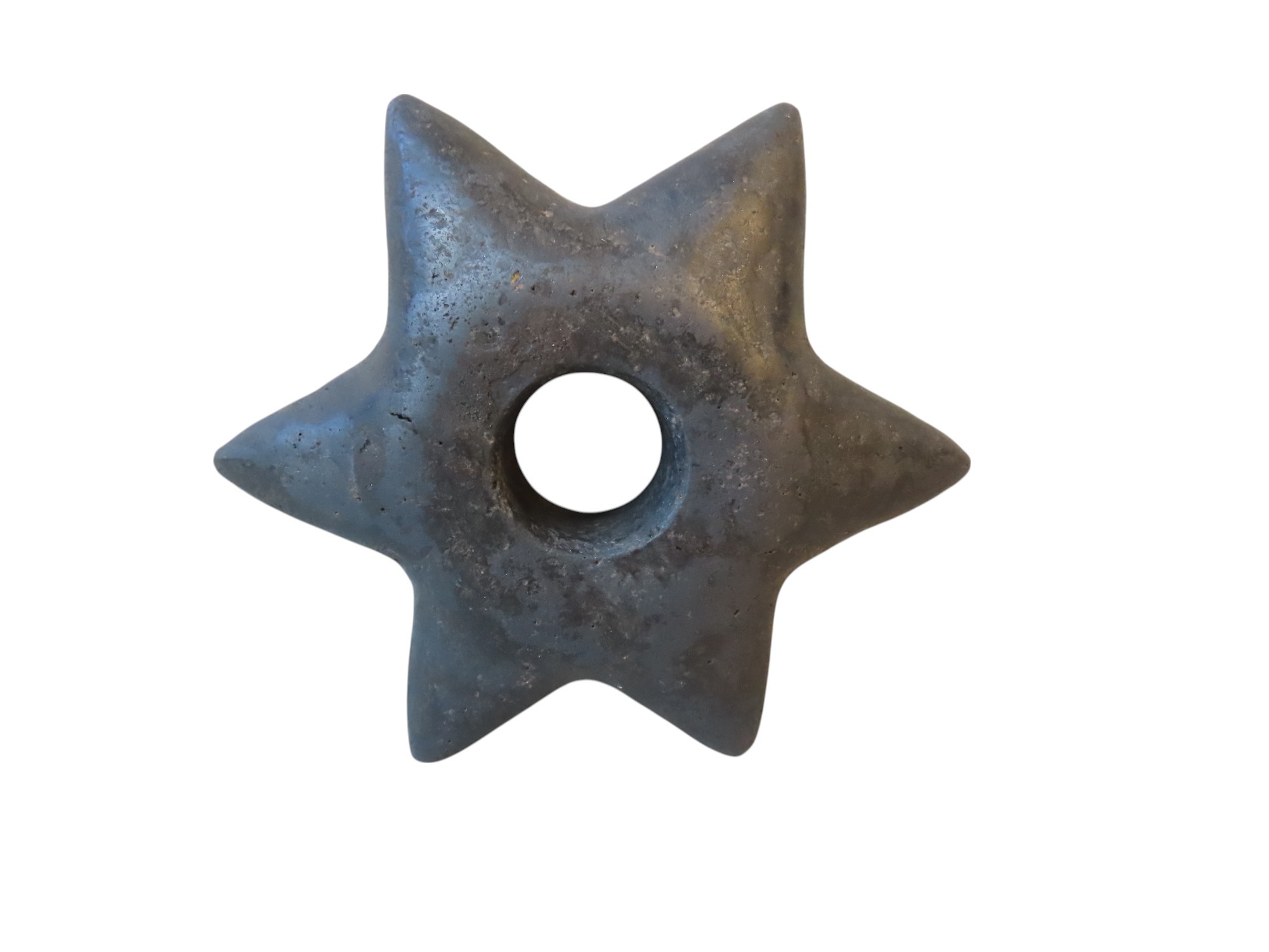 A PERUVIAN STAR-SHAPED STONE MACE HEAD with six points emanating from a ...