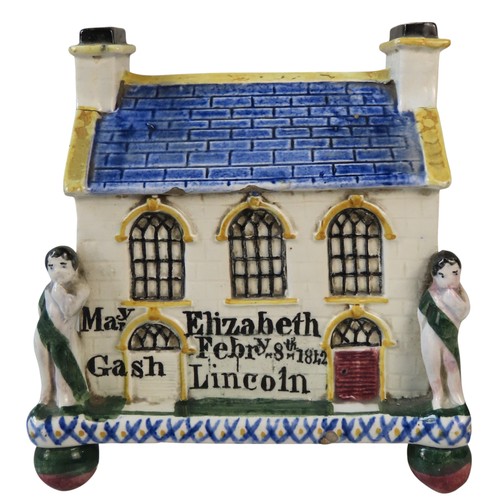 AN EARLY VICTORIAN PRATTWARE POTTERY WESLYAN CHAPEL MONEY BOX