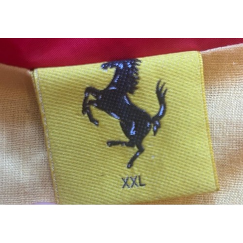108 - THREE BRANDED FERRARI JACKETSA 1990s Tommy Hilfiger Ferrari jacket in red polyester, windbreaker sty... 