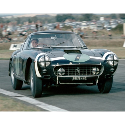 127 - AN ORIGINAL PERIOD STIRLING MOSS RACE SUITDirectly from the collection of Mr. Ron White. Ron White w... 