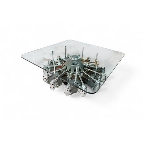 112 - JACOBS R-755 RADIAL ENGINE COFFEE TABLE A large square glass topped coffee table based on a a seven-... 