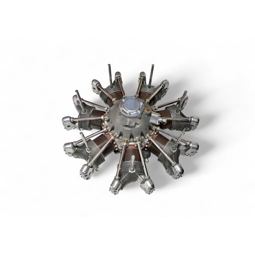 112 - JACOBS R-755 RADIAL ENGINE COFFEE TABLE A large square glass topped coffee table based on a a seven-... 