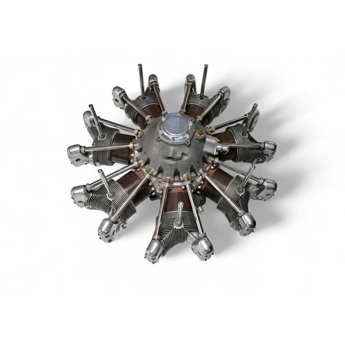 112 - JACOBS R-755 RADIAL ENGINE COFFEE TABLE A large square glass topped coffee table based on a a seven-... 