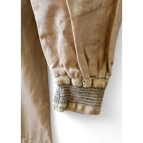 127 - AN ORIGINAL PERIOD STIRLING MOSS RACE SUITDirectly from the collection of Mr. Ron White. Ron White w... 