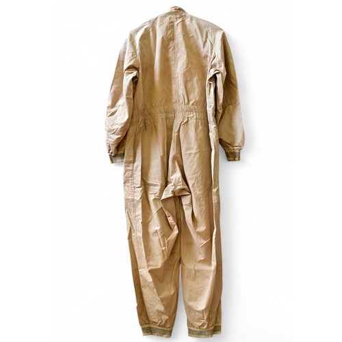 127 - AN ORIGINAL PERIOD STIRLING MOSS RACE SUITDirectly from the collection of Mr. Ron White. Ron White w... 