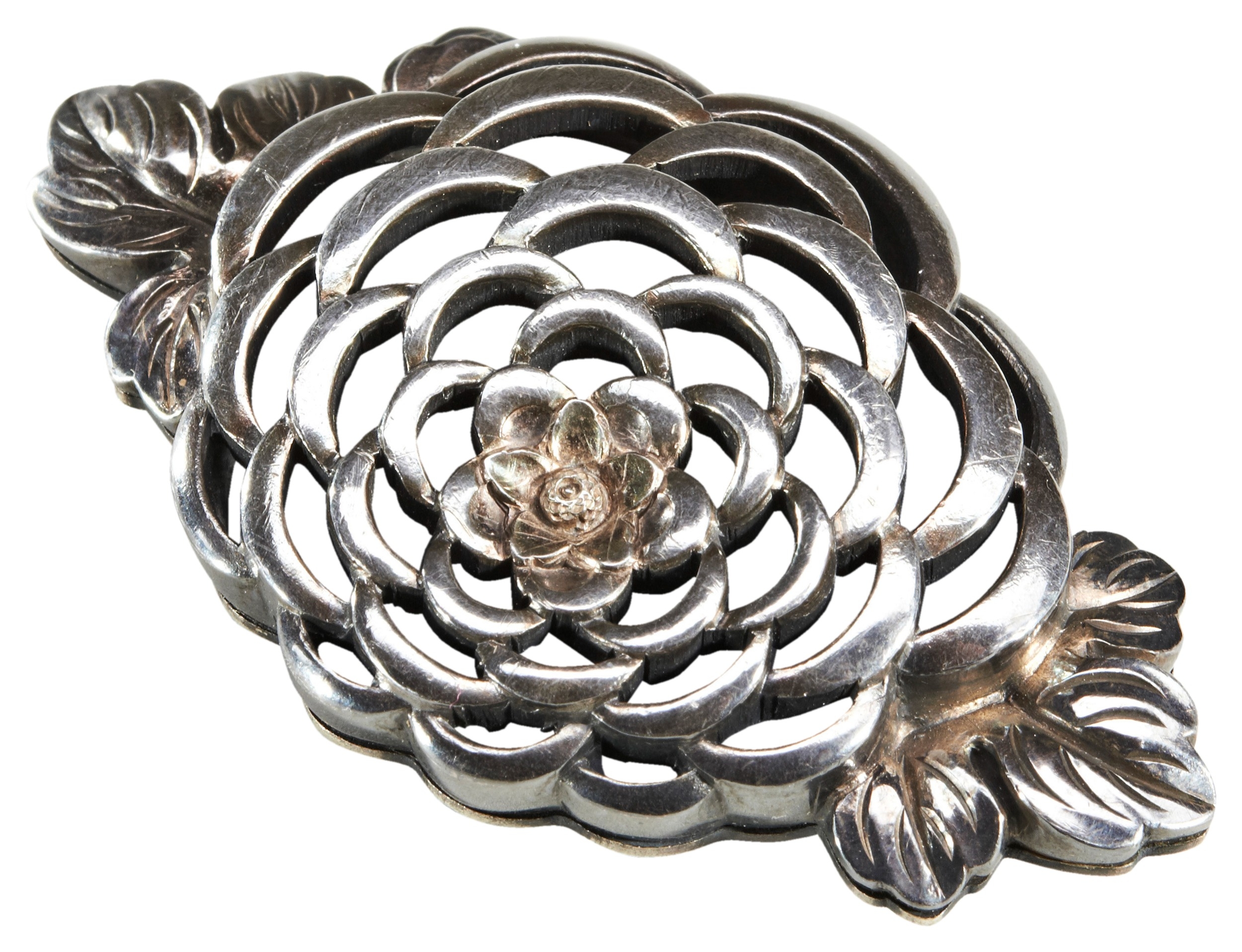 A JAPANESE SILVER-METAL OBIDOME 19TH CENTURYfinely worked in the form ...