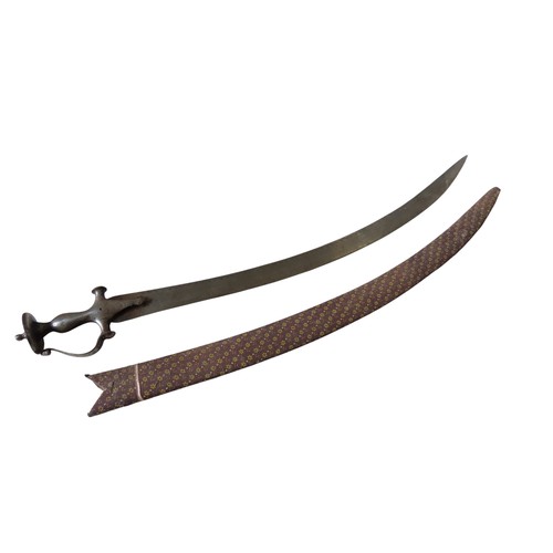 AN INDIAN STEEL TULWAR of typical form, the blade with simple ...