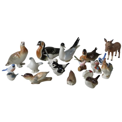 A MIXED GROUP OF FOURTEEN U.S.S.R BIRD MODELS(13.5 cm high max)together ...