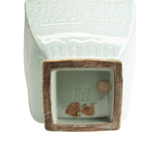 31 - A FINE MOULDED CELADON-GLAZED 'DRAGON' VASES WITH SWASTIKA IMPRESSED QIANLONG SEAL MARK, LATE QING D... 