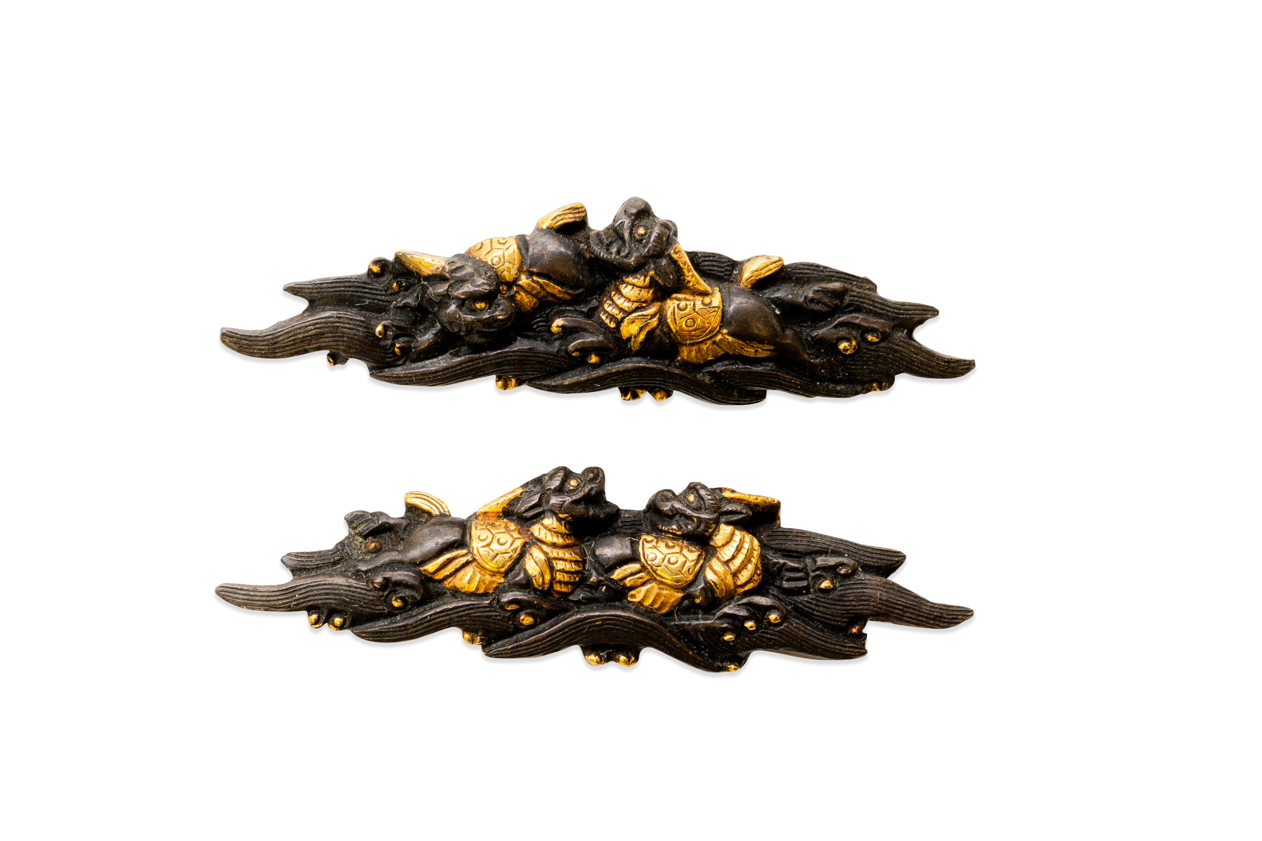 A PAIR OF MENUKI, EDO PERIOD, SHAKUDO, each with two mythical Kirin ...