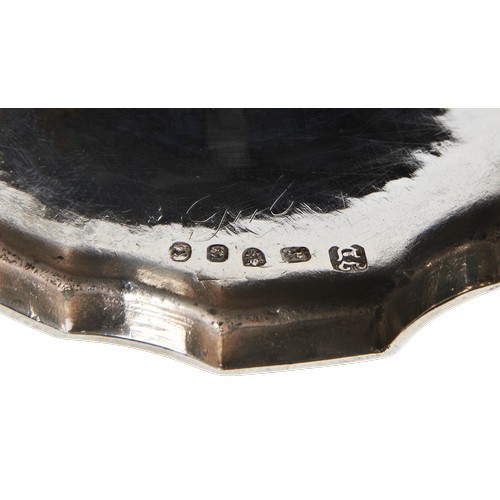 42 - A GEORGE III SILVER AND GILT SUGAR BASKETLONDON 1793marked for John Denziloe.oval fluted form with b... 