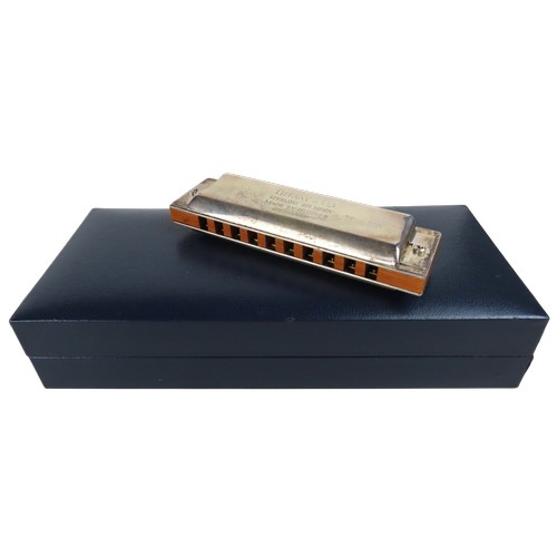 20 - A TIFFANY & CO SILVER SIDED HARMONICAmarked .925, with silk lined presentation boxHarmonica: 80 ... 
