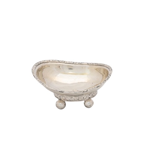 38 - A SILVER BOWLBirmingham, 1932, a small silver bowl with raised feet, an 800 standard silver salt and... 