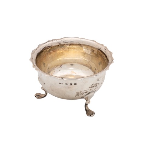 38 - A SILVER BOWLBirmingham, 1932, a small silver bowl with raised feet, an 800 standard silver salt and... 