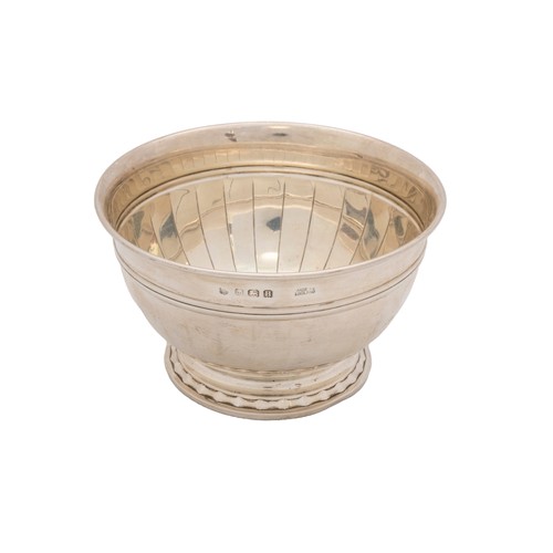 38 - A SILVER BOWLBirmingham, 1932, a small silver bowl with raised feet, an 800 standard silver salt and... 