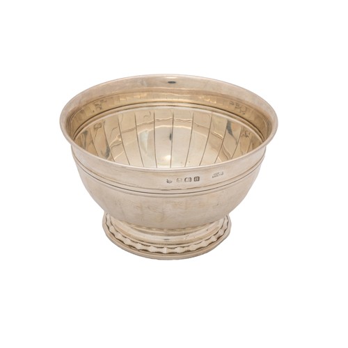 38 - A SILVER BOWLBirmingham, 1932, a small silver bowl with raised feet, an 800 standard silver salt and... 