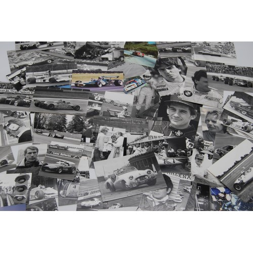 109 - c.100 Motor Racing PhotographsA collection of motor racing images, including action shots and driver... 