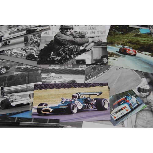109 - c.100 Motor Racing PhotographsA collection of motor racing images, including action shots and driver... 