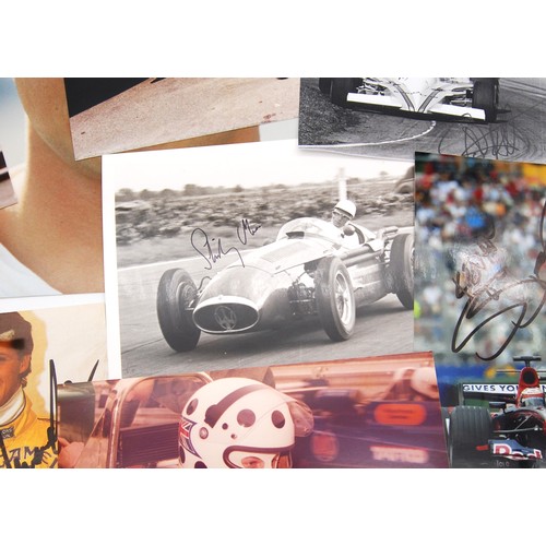 115 - Fourteen Signed Racing Driver PhotosFeaturing:Michael SchumacherJohn SurteesStirling MossVic ElfordJ... 