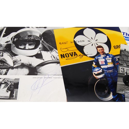 115 - Fourteen Signed Racing Driver PhotosFeaturing:Michael SchumacherJohn SurteesStirling MossVic ElfordJ... 