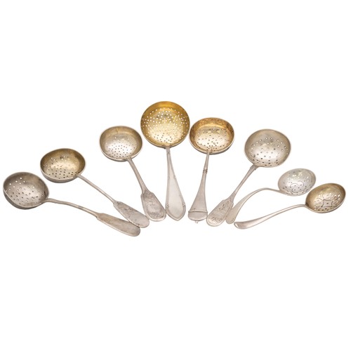 57 - AN ENGRAVED RUSSIAN SILVER SIFTING SPOON, 