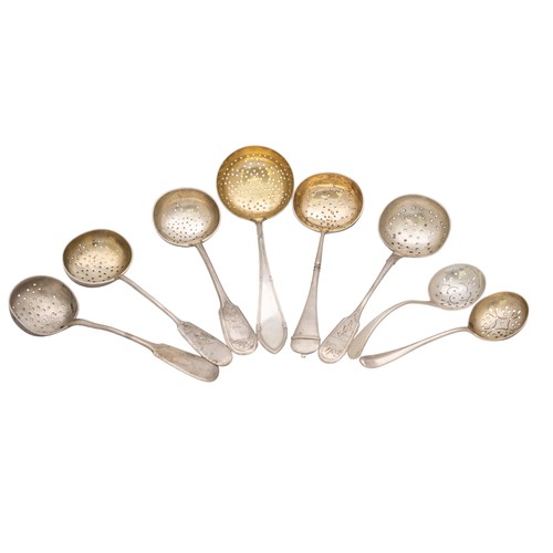 57 - AN ENGRAVED RUSSIAN SILVER SIFTING SPOON, 