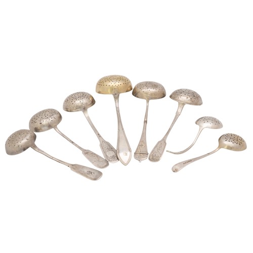 57 - AN ENGRAVED RUSSIAN SILVER SIFTING SPOON, 