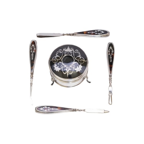 31 - A VINTAGE SILVER & TORTOISESHELL PIQUE WORK DRESSING TABLE SETBIRMINGHAM 1921the set includes a ... 