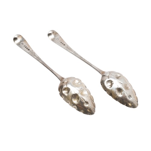 26 - A PAIR OF GEORGE III SILVER BERRY SPOONSLONDON 1793with bright cut leaf decorated handles, marked fo... 