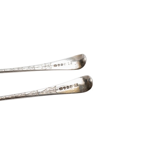 26 - A PAIR OF GEORGE III SILVER BERRY SPOONSLONDON 1793with bright cut leaf decorated handles, marked fo... 