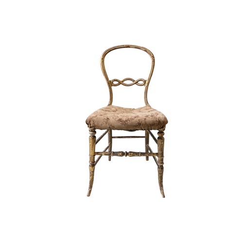 51 - A WHITE PAINTED FAUTEIL with striped pink fabric seat and a gilded stretcher bar bedroom chairFautei... 