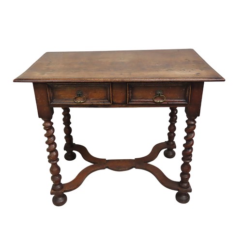14 - AN OAK SIDE TABLELATE 19TH CENTURYraised on four barley twist legs tied by an X-form stretcher75 x 9... 