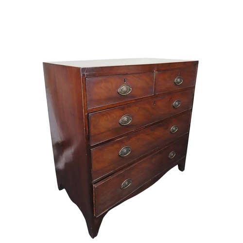 4 - A GOOD GEORGE III MAHOGANY AND CROSS BANDED CHEST OF DRAWERStwo short drawers over three long gradua... 