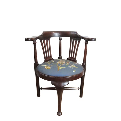 19 - A MAHOGANY CORNER CHAIR19TH CENTURYbow form scrolling top rail over two pierced splats, the seat cov... 