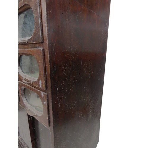 48 - A VINTAGE HABERDASHER'S STORAGE UNITcomprised of 16 glass fronted drawers over two sliding doors, be... 