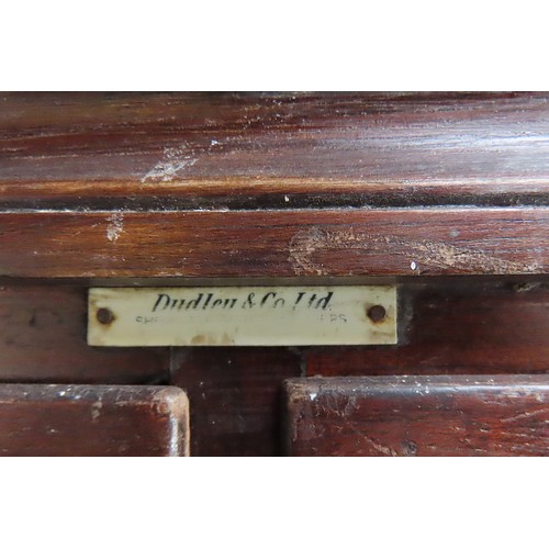 48 - A VINTAGE HABERDASHER'S STORAGE UNITcomprised of 16 glass fronted drawers over two sliding doors, be... 