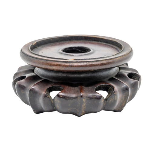 123 - A PINK GROUND 'MEDALLION' BOWL QIANLONG SEAL MARK AND OF THE PERIODtogether with a carved hardwood s... 