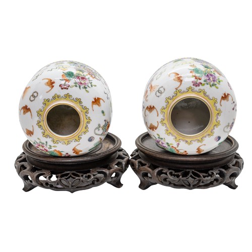 126 - A PAIR OF FAMILLE ROSE BEEHIVE WATERPOTSJIAQING SEAL MARK, 20TH CENTURYwith hardwood stands9.3cm dia... 