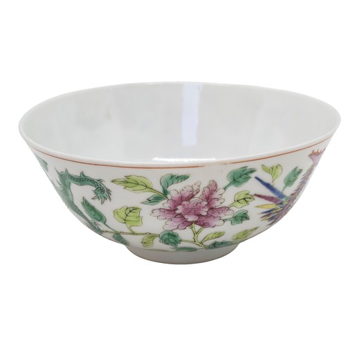 130 - A FAMILLE ROSE 'DRAGON AND PHOENIX' BOWLXIANFENG SEAL MARK AND OF THE PERIOD14cm diameter; together ... 